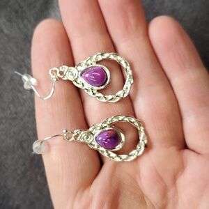 Purple stone silver colored tear drop earrings